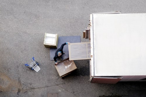 Professional movers loading furniture for a Barnes house move
