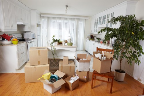 Loading furniture and boxes into a van for a Barnes move