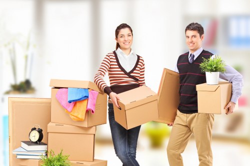 Loading furniture and boxes into a van in Barnes
