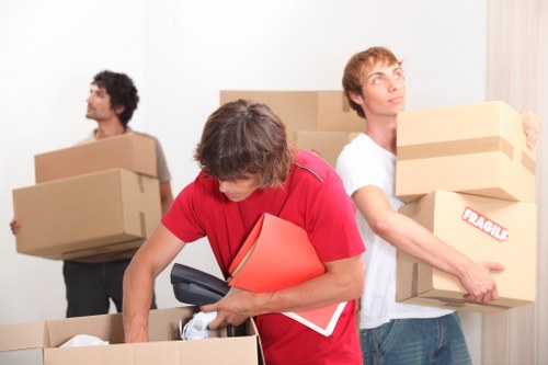 Packed boxes and furniture loaded for transport on a moving truck