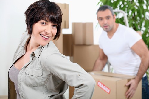 Local moving team loading furniture for a Barnes property