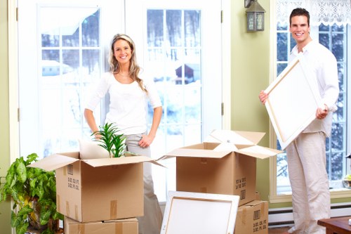 Household furniture being carried safely during a Barnes relocation